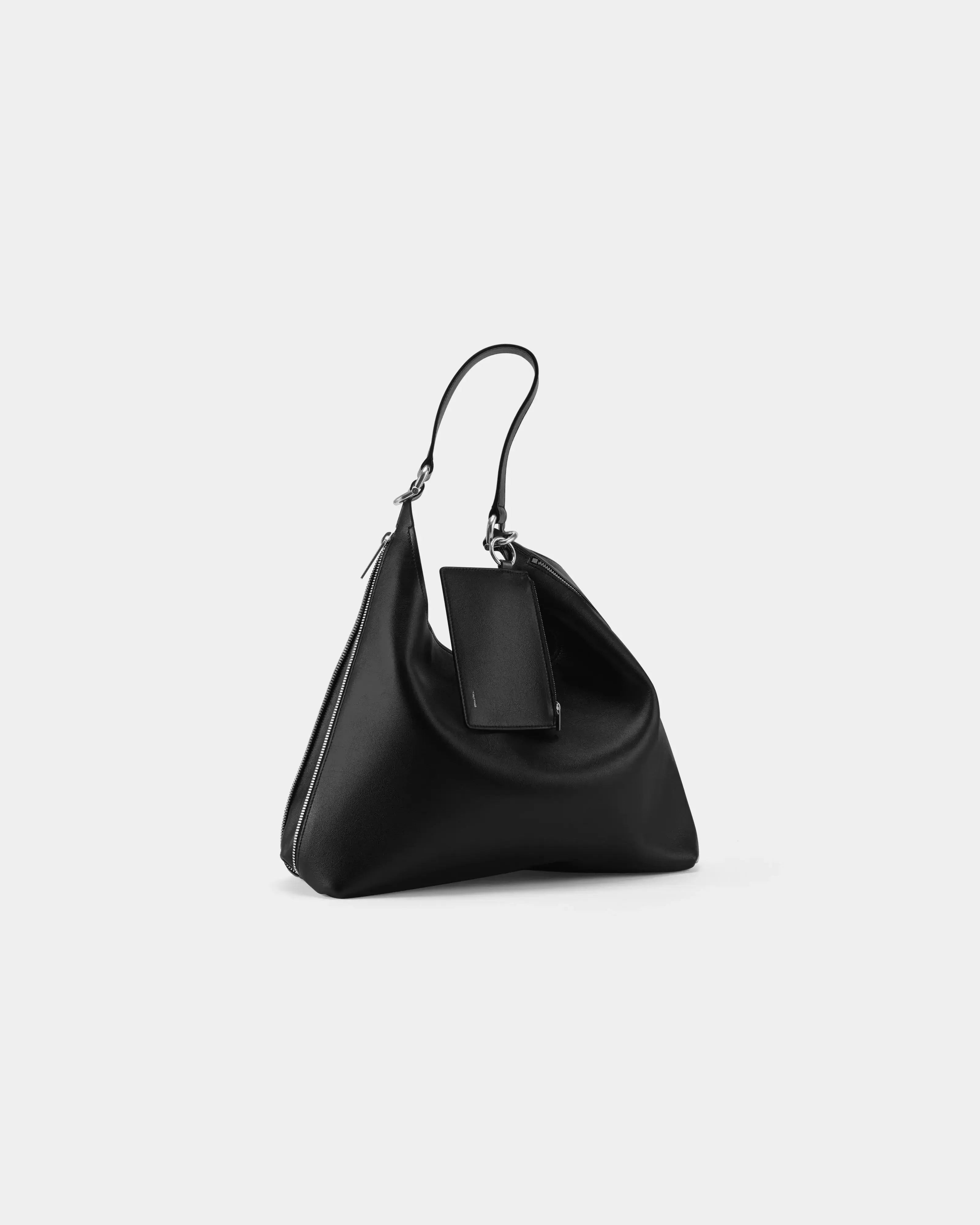 TAD-FAB-Zip-Hobo-matte-black-calfskin-shoulder-bag-front-side-view