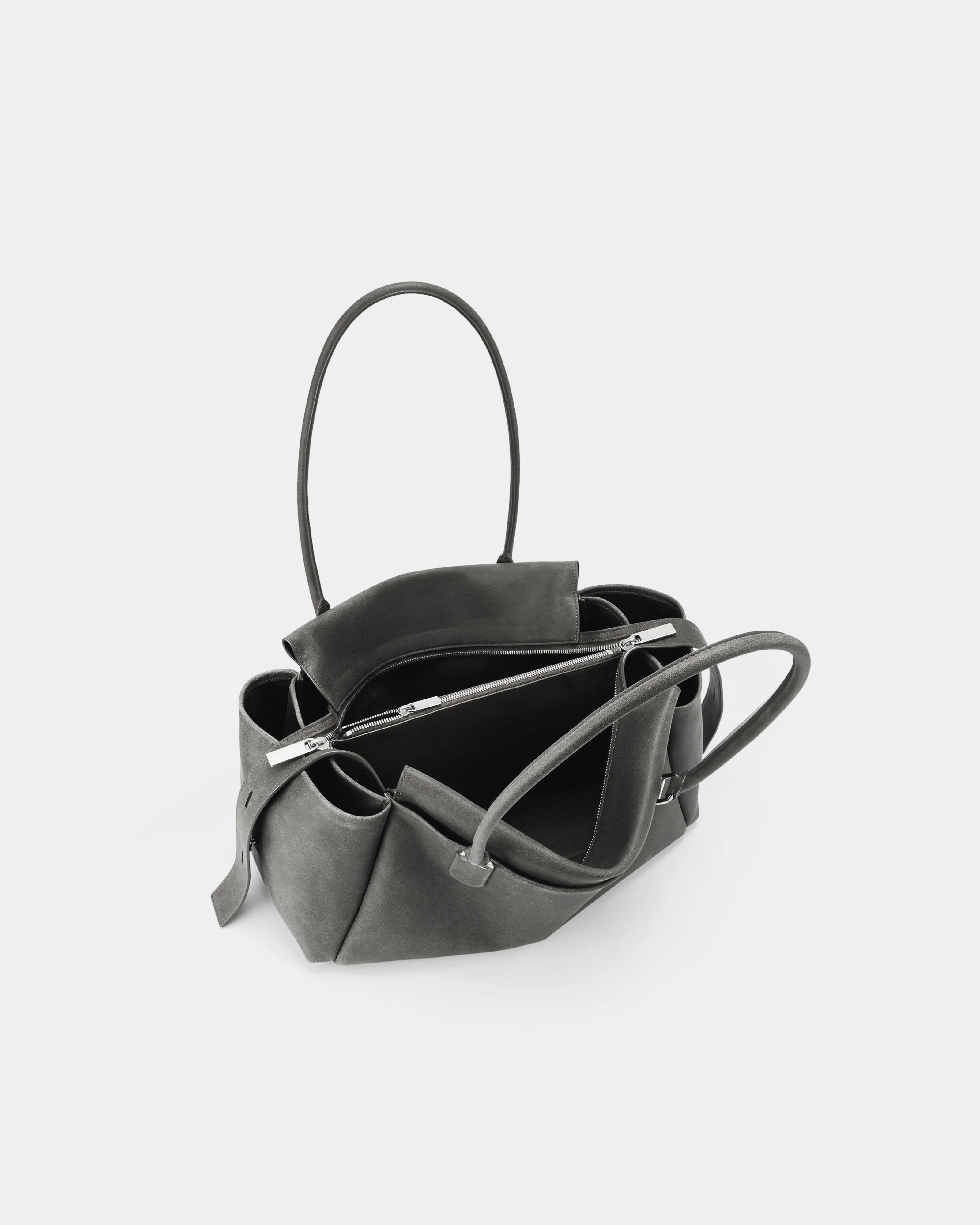 Top down view of Cargo Maxi bag highlighting the vintage cowhide and spacious interior.