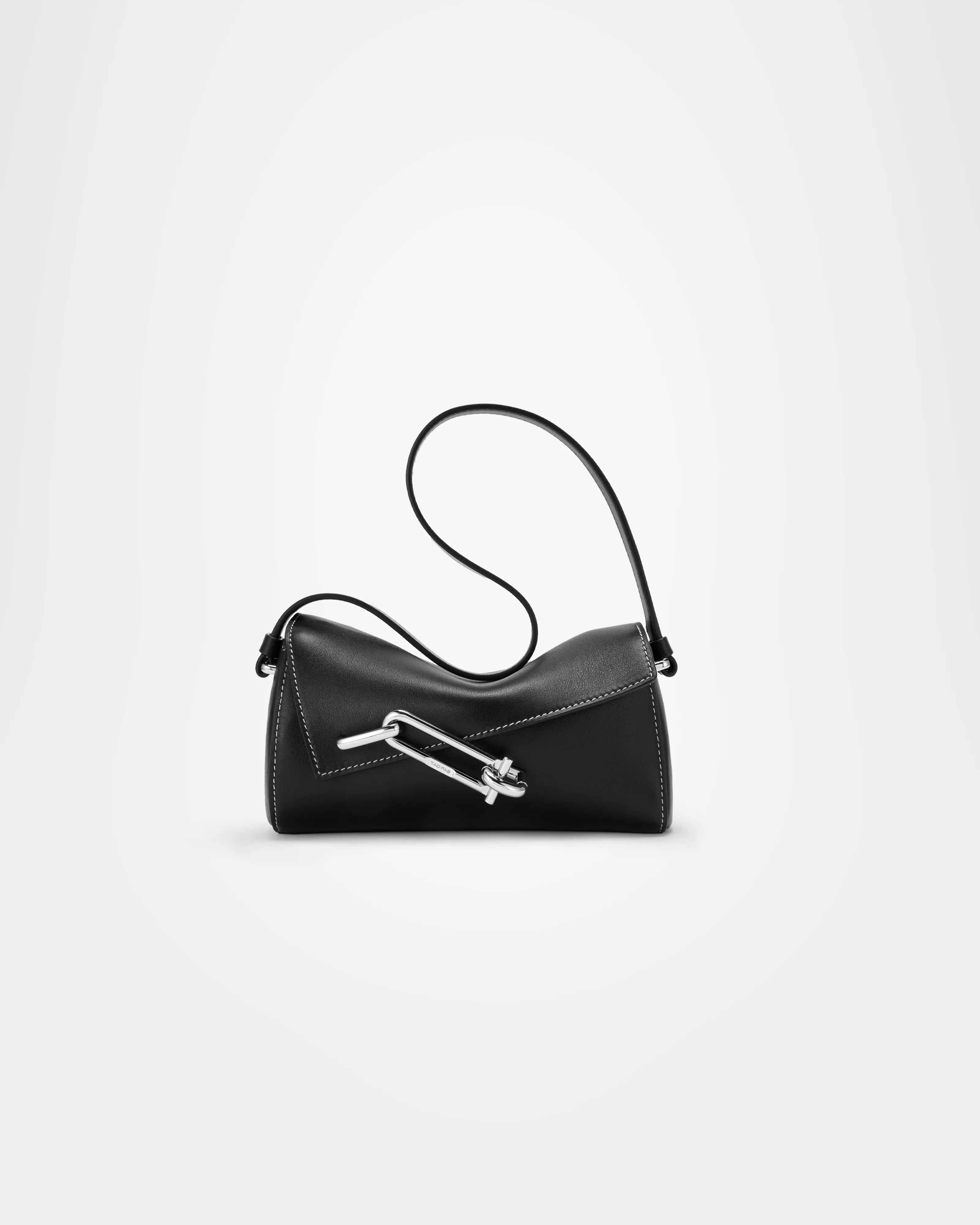 TAD-FAB-Softie-Mini-matte-black calfskin-shoulder-bag-side-view-with-silver-tone-carabiner-style-buckle
